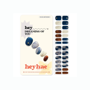 Heyhae semi cured gel nail strips in "Hey, Dreaming of You" design featuring blue, gold stars, and glitter accents.