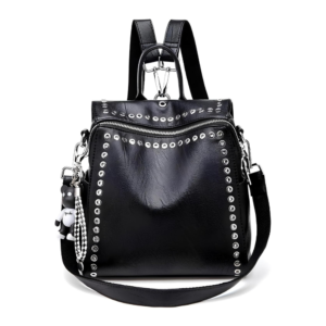 Convertible Backpack Purse in black vegan leather being worn as a shoulder bag and tote