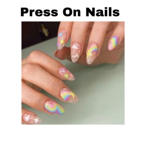 Rainbow press on nails featuring nude base with cute cloud designs in a medium almond shape